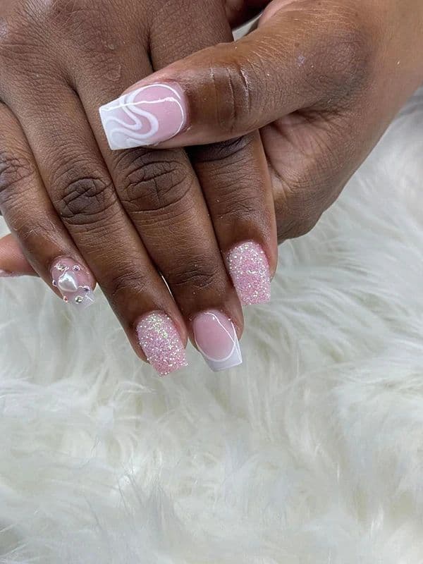 Pretty in pink — nail design by T Nails Charlotte