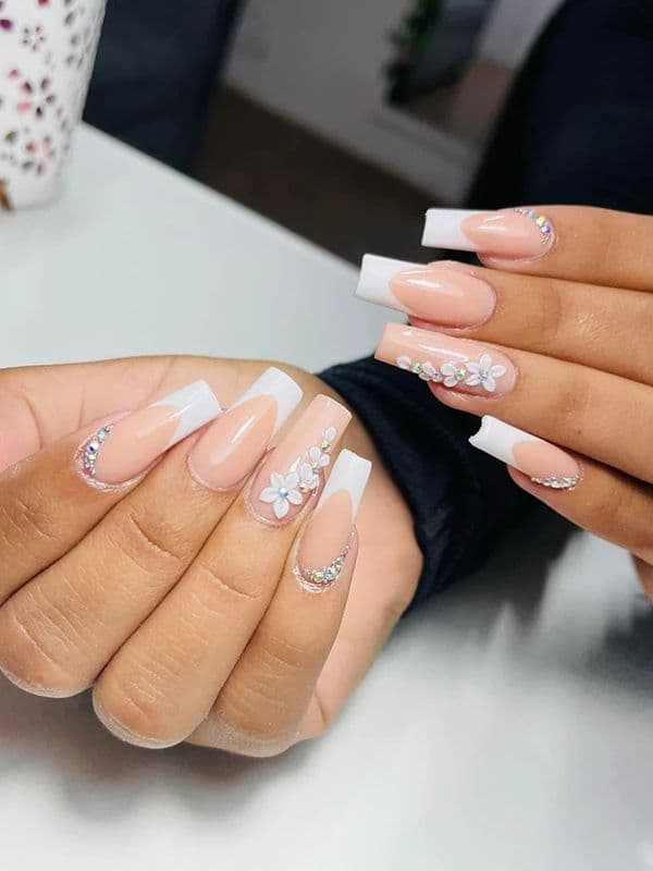 A timeless French — nail design by T Nails Charlotte